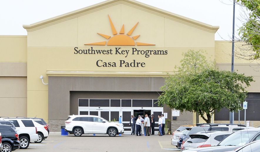 Dignitaries take a tour of Southwest Key Programs Casa Padre, a U.S. immigration facility in Brownsville, Texas, Monday, June 18, 2018, where children are detained. (Miguel Roberts/The Brownsville Herald via AP)