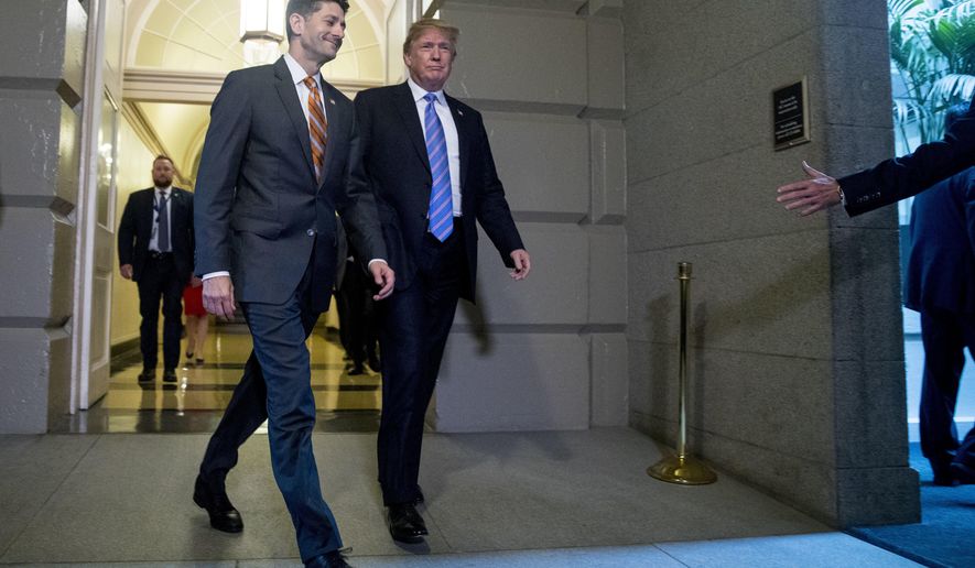 President Donald Trump, accompanied by House Speaker Paul Ryan of Wis., arrives on Capitol Hill in Washington, Tuesday, June 19, 2018, to rally Republicans around a GOP immigration bill.  (AP Photo/Andrew Harnik)