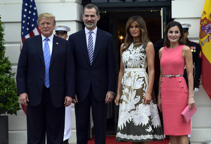 President Donald Trump, left, poses for a photo with Spain's King Felipe VI, second from left, first lady Melania Trump, third from right, and Queen Letizia, right, on the South Lawn of the White House in Washington, Tuesday, June 19, 2018. (AP Photo/Susan Walsh) ** FILE **