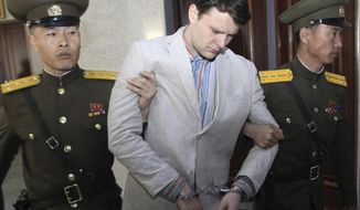 American student Otto Warmbier, center, is escorted at the Supreme Court in Pyongyang, North Korea. Warmbier’s legacy is still being written, one year after his death. The 22-year-old U.S. college student who died in a Cincinnati hospital just days after his release from North Korea in a vegetative state has been remembered prominently during a dramatic shift in U.S.-North Korean relations. (AP Photo/Jon Chol Jin, File)