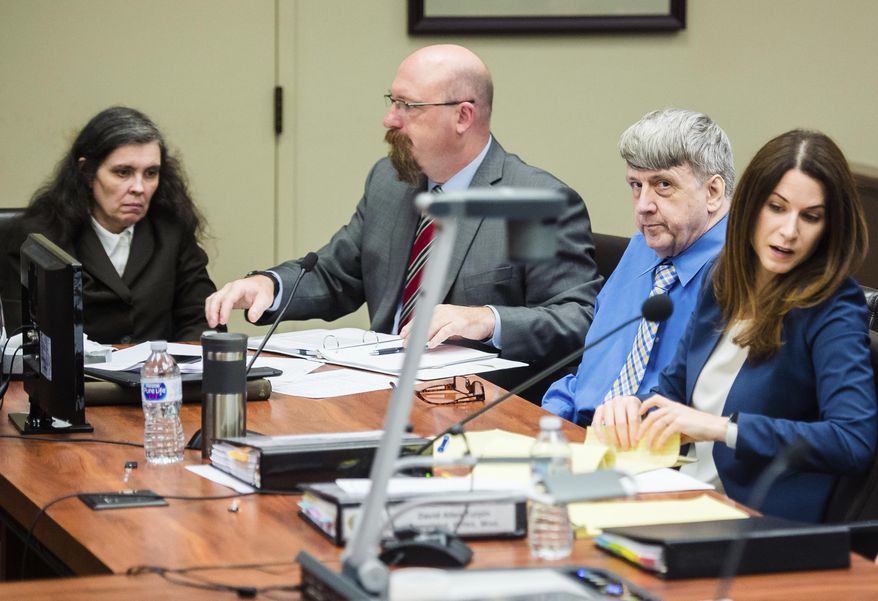 Louise Turpin, left, with her attorney Jeff Moore, and her husband, David Turpin, center, with his attorney Allison Lowe, right, appear for a preliminary hearing in Superior Court, Wednesday, June 20, 2018, in Riverside, Calif. The couple have pleaded not guilty to child abuse, torture and other charges. (Watchara Phomicinda/The Press-Enterprise via AP)