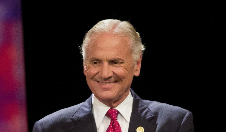 Governor Henry McMaster gives two thumbs up during the gubernatorial debate Wednesday, June 20, 2018 at Newberry Opera House in Newberry, S.C. (Andrew Whitaker/The Post And Courier via AP)