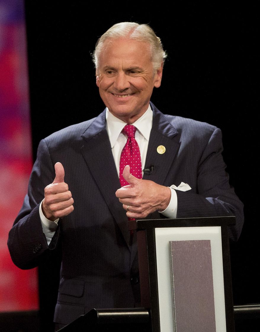 Governor Henry McMaster gives two thumbs up during the gubernatorial debate Wednesday, June 20, 2018 at Newberry Opera House in Newberry, S.C. (Andrew Whitaker/The Post And Courier via AP)