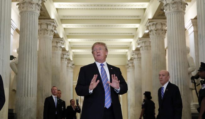 President Donald Trump speaks in the Hall of Columns as he arrives on Capitol Hill in Washington, Tuesday, June 19, 2018, to rally Republicans around a GOP immigration bill. However Republicans on Capitol Hill, mindful of the country&#x27;s spreading outrage over separating families at the border, have been frantically searching for ways to end the Trump administration&#x27;s policy. (AP Photo/Alex Brandon)