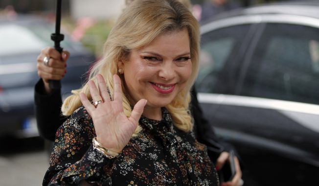 In this Wednesday, June 6, 2018, file photo, Israel&#x27;s Prime Minister&#x27;s wife Sara Netanyahu arrives for the meeting with French Finance Minister Bruno Le Maire at Bercy Economy Ministry, in Paris, France. Israeli prosecutors have charged Sara Netanyahu, the prime minister&#x27;s wife, with a series of crimes including fraud and breach of trust. (AP Photo/Francois Mori, File)
