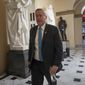 Rep. Mark Meadows, R-N.C., center, chairman of the conservative House Freedom Caucus, walks to the House chamber at the Capitol in Washington, Thursday, June 21, 2018. (AP Photo/J. Scott Applewhite) ** FILE **