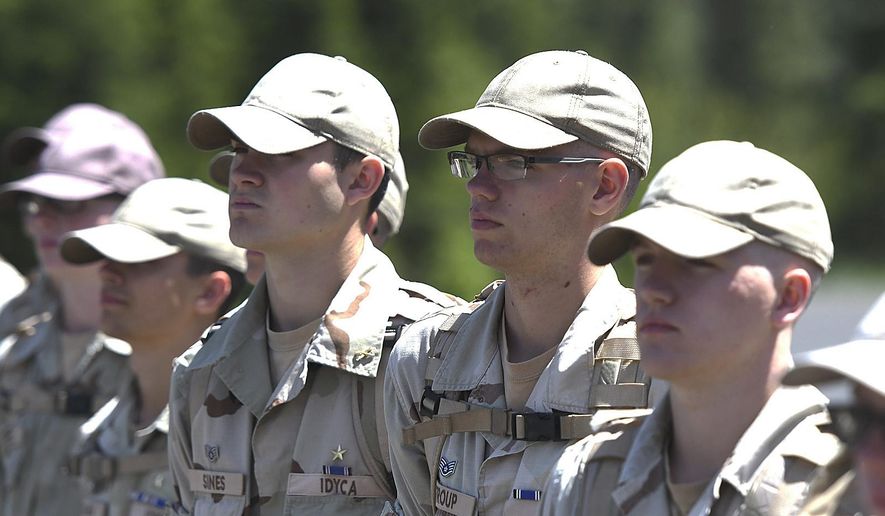 Cadets stand at attention in formation at the Idaho Youth ChalleNGe Academy in Pierce, Idaho. The Idaho Youth Challenge Academy doesn&#x27;t accept kids with felony charges, but it can be used as an alternative to those types of sentences, according to principal Bicker Therien. (Steve Hanks/Lewiston Tribune via AP)