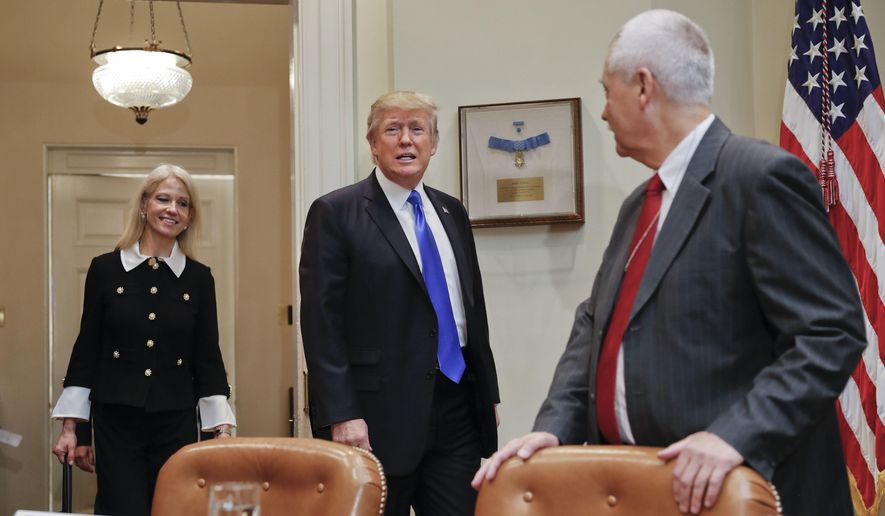 In this Feb. 1, 2017, file photo, President Donald Trump, followed by Counselor to the President Kellyanne Conway, left, walks into the Roosevelt Room of the White House in Washington as David O'Steen of the National Right to Life watches. (AP Photo/Pablo Martinez Monsivais) ** FILE **