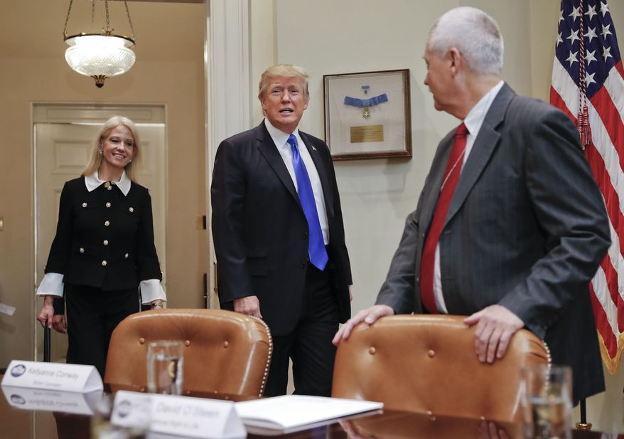 In this Feb. 1, 2017, file photo, President Donald Trump, followed by Counselor to the President Kellyanne Conway, left, walks into the Roosevelt Room of the White House in Washington as David O'Steen of the National Right to Life watches. (AP Photo/Pablo Martinez Monsivais) ** FILE **