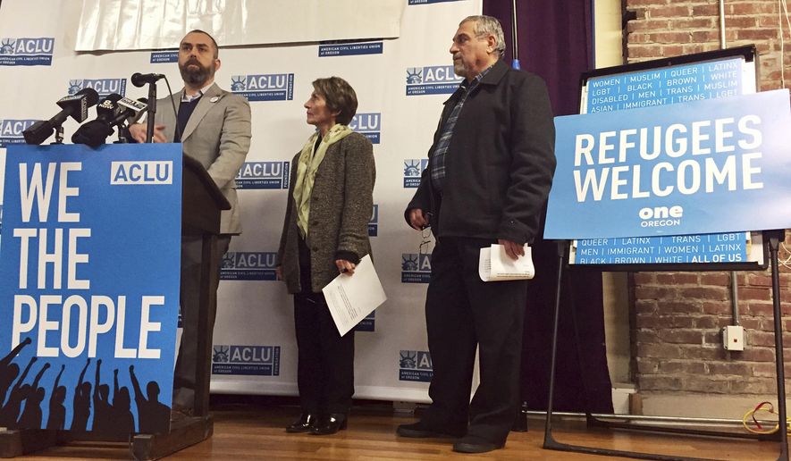 FILE- In this Feb. 1, 2017 file photo, ACLU of Oregon legal director Mat dos Santos speaks at a news conference in Portland to announce a federal lawsuit filed in U.S. District Court in Portland against President Donald Trump's executive immigration order. A rights group has filed an emergency suit in federal court against top officials of U.S. immigration and homeland security departments, alleging they have unconstitutionally denied lawyers' access to immigrants being held in a federal prison in Oregon. (AP Photo/Gillian Flaccus, File)