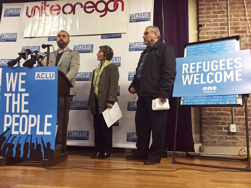 FILE- In this Feb. 1, 2017 file photo, ACLU of Oregon legal director Mat dos Santos speaks at a news conference in Portland to announce a federal lawsuit filed in U.S. District Court in Portland against President Donald Trump's executive immigration order. A rights group has filed an emergency suit in federal court against top officials of U.S. immigration and homeland security departments, alleging they have unconstitutionally denied lawyers' access to immigrants being held in a federal prison in Oregon. (AP Photo/Gillian Flaccus, File)