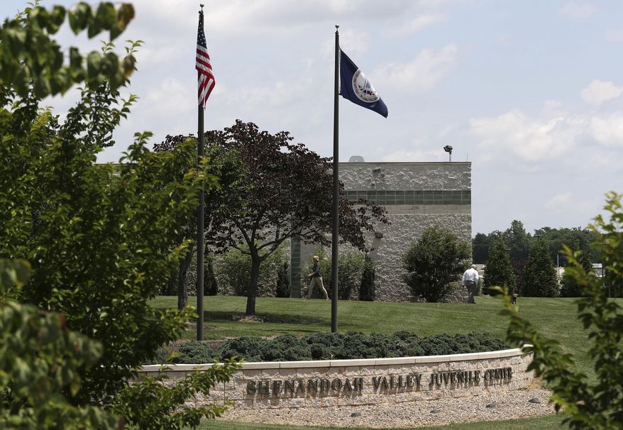 The Shenandoah Valley Juvenile Center is shown Wednesday, June 20, 2018 in Staunton, Va. The young immigrants held without their parents in prison-like conditions at a juvenile detention center in the mountains of Virginia express despair. Some cling to pleasant memories from home. For a select few, there is hope. For a handful of immigrants who came to the U.S. from central America _ many as unaccompanied minors _ poetry has afforded them an opportunity to tell the world both about their journeys north _ and through the byzantine immigration system. (AP Photo/Zachary Wajsgras)