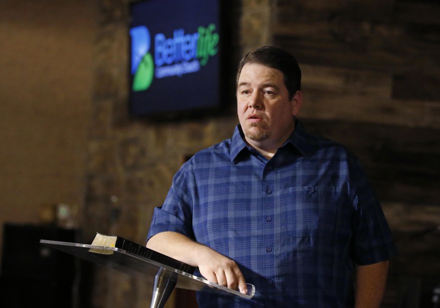 Pastor Danny Daniels poses for a photo inside his Better Life Community Church in Lindsay, Okla., Friday, June 15, 2018. Daniels is among a growing group of traditionally conservative Republican voters who have shifted their position in favor of medical marijuana and who could ensure passage on Tuesday of the first medical marijuana state question on a ballot this year. (AP Photo/Sue Ogrocki)