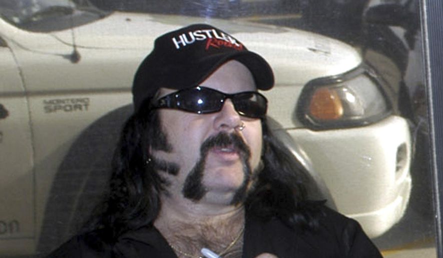 In this May 20, 2004 file photo shows Vinnie Paul Abbott in Amarillo, Texas. Paul, co-founder and drummer of metal band Pantera, has died at 54. Pantera’s official Facebook page posted a statement early Saturday, June 23, 2018 announcing his death. Paul’s representative confirmed the death to Billboard. No cause of death was mentioned. Paul’s real name was Vincent Paul Abbott. He and his brother, Dimebag Darrell, formed Pantera in 1981.(AP Photo/Ralph Duke, File)
