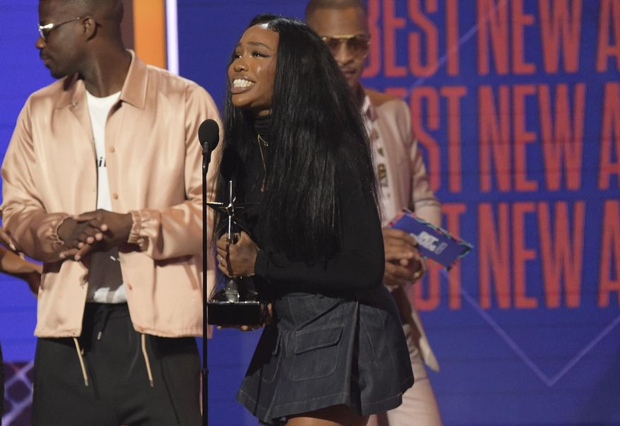 SZA accepts the award for best new artist at the BET Awards at the Microsoft Theater on Sunday, June 24, 2018, in Los Angeles. (Photo by Richard Shotwell/Invision/AP)