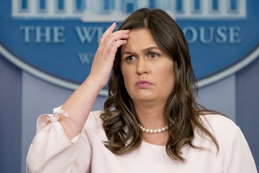 White House press secretary Sarah Huckabee Sanders listens to a question during the daily press briefing at the White House, Monday, June 4, 2018, in Washington. Sanders discussed, Trump&#39;s pardon powers, EPA Administrator Scott Pruitt, and other topics. (AP Photo/Andrew Harnik)