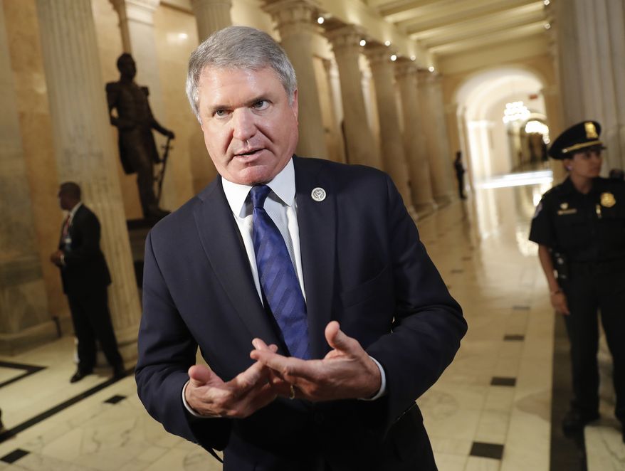 Chairman of the Homeland Security Committee, Rep. Michael McCaul, R-Texas, stops to talk to members of the media after meeting with President Donald Trump and members of the GOP leadership at the U.S. Capitol, Tuesday, June 19, 2018. (AP Photo/Pablo Martinez Monsivais)