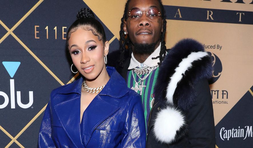 FILE- In this Feb. 3, 2018, file photo, Cardi B, left, and Offset arrive at the Maxim Super Bowl Party at the Maxim Dome in Minneapolis. A marriage certificate shows hip-hop stars Cardi B and the Migos’ Offset were married months ago in Atlanta. Cardi B confirmed the marriage in a tweet Monday. (Photo by Omar Vega/Invision/AP, File)