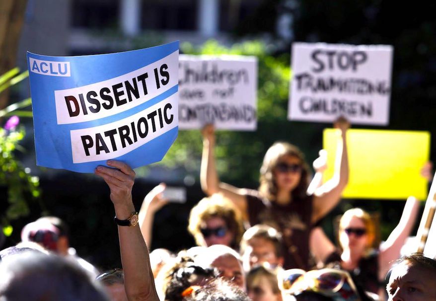 Protesters rally in Philadelphia to protest a recent visit to the city by Vice President Mike Pence. One columnist warns of a "soft civil war." (Associated Press)