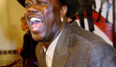 Bernie Mac yells to onlookers as he arrives to the premiere of his film  &quot;Ocean&#39;s Eleven&quot; in Los Angeles. The award-winning actor-comedian has died at age 50 from complications of pneumonia, his publicist said Saturday, Aug. 9, 2008. (AP Photo/Chris Pizzello, file)