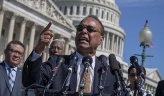 Rep. Luis Gutierrez, D-Ill., a leading advocate in the House for immigration reform, joins supporters of &quot;dreamers&quot; as they mark the 6th anniversary of the announcement of the Deferred Action for Childhood Arrivals (DACA) program, on Capitol Hill in Washington, Friday, June 15, 2018. President Donald Trump ignited eleventh-hour confusion Friday over Republican efforts to push immigration through the House next week, saying he won&#39;t sign a &quot;moderate&quot; package, an apparent damaging blow to GOP lawmakers hoping to push legislation through the House next week. The tumult erupted days before GOP leaders planned campaign-season votes on a pair of Republican bills: a hard-right proposal and a middle-ground plan negotiated by the party&#39;s conservative and moderate wings. (AP Photo/J. Scott Applewhite)