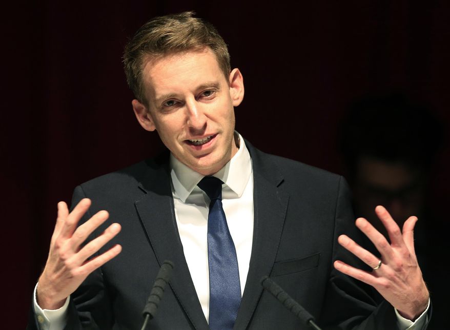 FILE - In this Nov. 9, 2016, file photo, Democrat Jason Kander speaks during an election watch party at the Uptown Theater in Kansas City, Mo. Kander a former Missouri state official and rising star in the Democratic Party has announced plans to run for mayor of Kansas City. The Kansas City Star reported that Jason Kander confirmed Sunday, June 24, 2018, his decision. The Afghanistan war veteran is planning a formal announcement of his candidacy Monday morning. (AP Photo/Orlin Wagner File)