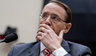 Deputy Attorney General Rod Rosenstein pauses while testifying before a House Committee on the Judiciary oversight hearing on Capitol Hill, Wednesday, Dec. 13, 2017 in Washington. Two FBI officials who would later be assigned to the special counsel&#39;s investigation into Donald Trump&#39;s presidential campaign described him with insults like &quot;idiot&quot; and &quot;loathsome human&quot; in a series of text messages last year, according to copies of the messages released Tuesday. (AP Photo/Andrew Harnik)