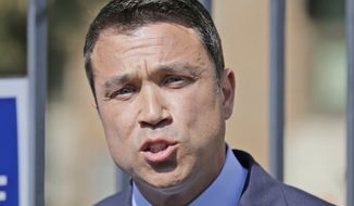 Former U.S. Rep. Michael Grimm talks to reporters in front of his polling site in the Staten Island borough of New York, Tuesday, June 26, 2018. New York City&#39;s only Republican congressman, U.S. Rep. Daniel Donovan, will try to hold off a fierce challenge in the state&#39;s primary election Tuesday from former U.S. Rep. Michael Grimm, who is trying to make a political comeback after serving prison time for tax fraud. (AP Photo/Seth Wenig)
