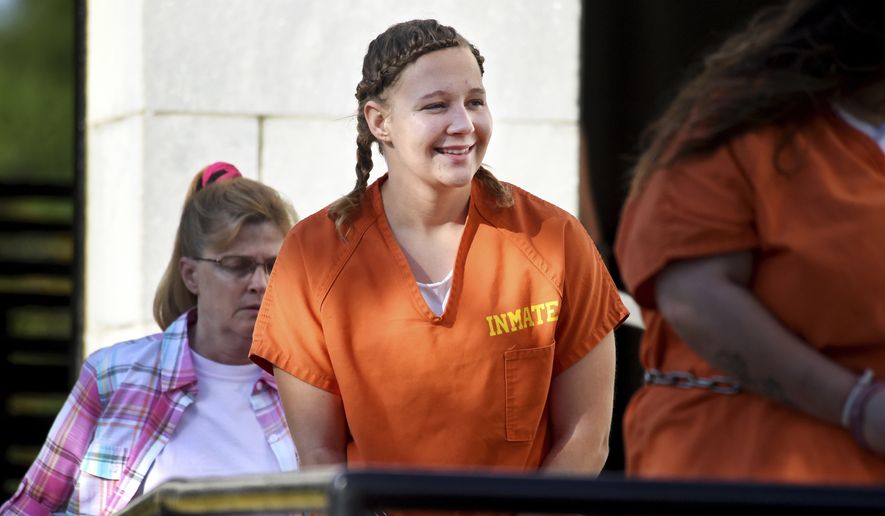 Reality Winner, charged with leaking U.S. secrets to a news outlet, walks into the Federal Courthouse in Augusta, Ga., Tuesday, June 26, 2018. (Michael Holahan/The Augusta Chronicle via AP)