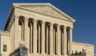 In this April 20, 2018, file photo, the Supreme Court is seen in Washington.  The Supreme Court has upheld President Donald Trump&#39;s ban on travel from several mostly Muslim countries, rejecting a challenge that it discriminated against Muslims or exceeded his authority. (AP Photo/J. Scott Applewhite, File)