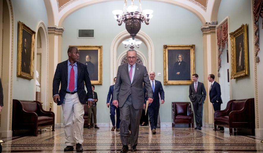 &quot;Mr. President, here&#39;s your chance,&quot; said Senate Minority Leader Sen. Charles E. Schumer (center.) &quot;Join us. We&#39;d like to do this on a bipartisan basis,&quot; said the New York Democrat, regarding immigration reform legislation currently being debated in Congress. (Associated Press)