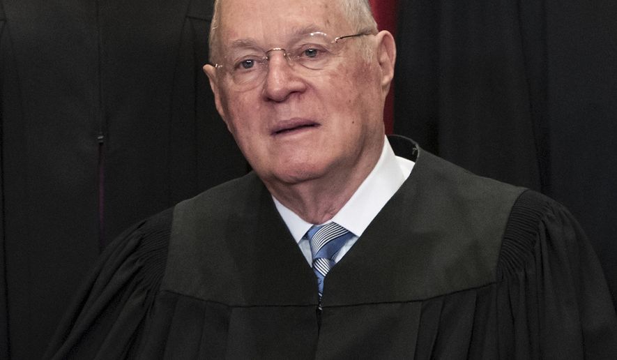 FILE - In this June 1, 2017, file photo, Supreme CourtAssociate Justice Anthony M. Kennedy joins other justices of the U.S. Supreme Court for an official group portrait at the Supreme Court Building in Washington. The 81-year-old Kennedy said Tuesday, June 27, 2018, that he is retiring after more than 30 years on the court.(AP Photo/J. Scott Applewhite, File)