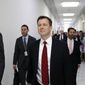 Peter Strzok, second from right, the FBI agent facing criticism following a series of anti-Trump text messages, walks to gives a deposition before the House Judiciary Committee on Capitol Hill in Washington, Wednesday, June 27, 2018. (AP Photo/Alex Brandon) ** FILE **