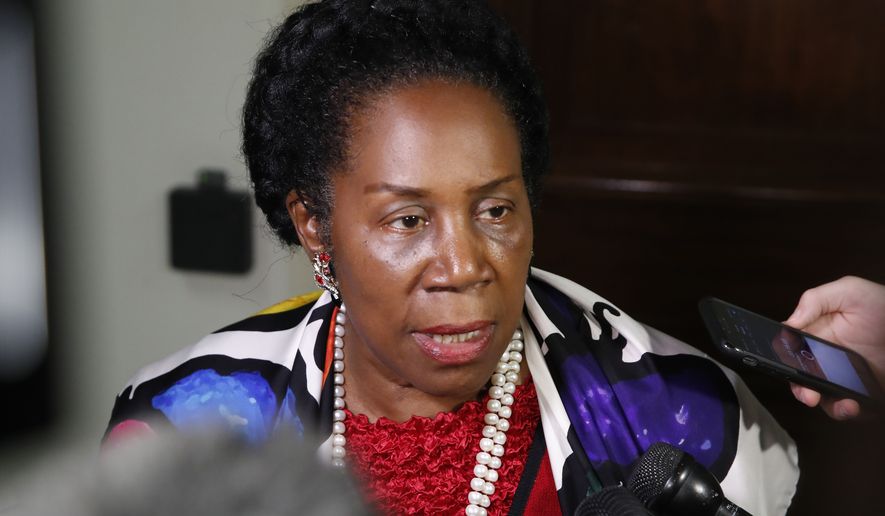 Rep. Sheila Jackson Lee, D-Texas, speaks as she departs a deposition before the House Judiciary Committee by Peter Strzok, the FBI agent facing criticism following a series of anti-Trump text messages, on Capitol Hill, Wednesday, June 27, 2018 in Washington. (AP Photo/Alex Brandon)