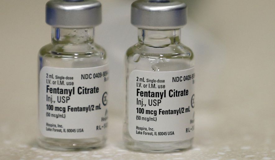 In this Friday, June 1, 2018, photo, small vials of fentanyl are shown in the inpatient pharmacy at the University of Utah Hospital in Salt Lake City. Amid the nation's opioid epidemic, hospitals are struggling to get widely used injected pain medicines because of ongoing supply shortages. The shortages affect just about every corner of the hospital, from the operating room and emergency department. (AP Photo/Rick Bowmer)