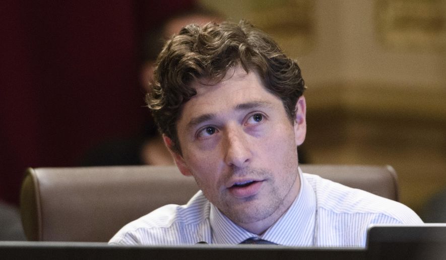 In this May 27, 2016, file photo, then-Minneapolis City Council member Jacob Frey speaks during a city council meeting in Minneapolis. Now serving as city mayor, Mr. Frey has come under fire from President Trump over how much he is expecting the Trump campaign to foot for security costs for an upcoming political rally in the city. (Glen Stubbe/Star Tribune via AP, File) **FILE**
