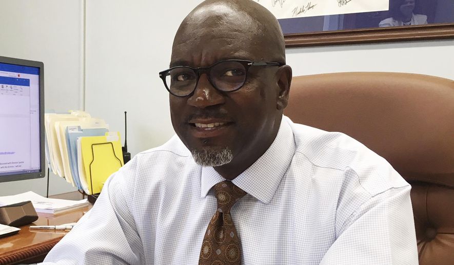 In this June 5, 2018 photo, North Carolina Prisons Director Kenneth Lassiter discusses efforts to more accurately count assaults on employees and inmates during an interview in his Raleigh, NC. About four assaults take place in North Carolina’s prisons every day, according to new data collected by officials working to address violence in the state system. (AP Photo/ Emery P. Dalesio)