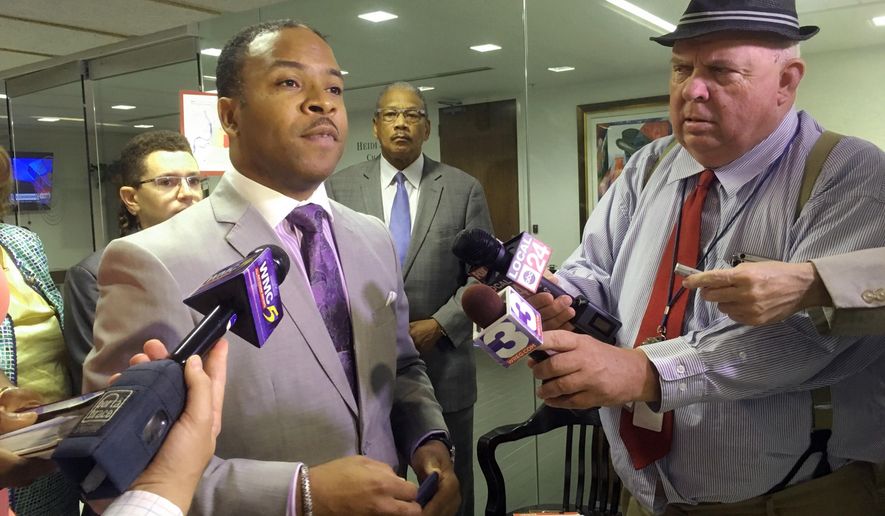 From left, Corey Strong the Democratic Party chair in Shelby County, Tenn., speaks with reporters about early voting locations for the August elections on Wednesday, June 27, 2018, in Memphis. Strong criticized Wednesday the decision by the county Election Commission to make Agricenter International the only open polling location on the first five days of the early voting process, which starts July 13. (AP Photo/Adrian Sainz).