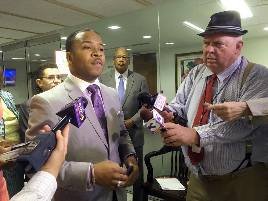 From left, Corey Strong the Democratic Party chair in Shelby County, Tenn., speaks with reporters about early voting locations for the August elections on Wednesday, June 27, 2018, in Memphis. Strong criticized Wednesday the decision by the county Election Commission to make Agricenter International the only open polling location on the first five days of the early voting process, which starts July 13. (AP Photo/Adrian Sainz).