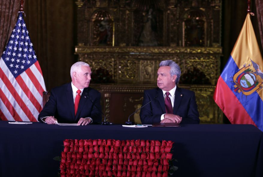 U.S. Vice President Mike Pence, left, and Ecuador&#39;s President Lenin Moreno exchange looks during the delivery of a final statement at the government palace in Quito, Ecuador, Thursday, June 28, 2018. (AP Photo/Dolores Ochoa)