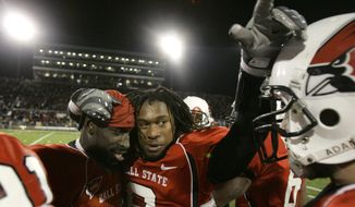 FILE - In this Nov. 25, 2008, file photo, Ball State linebacker Wendell Brown, left, stands with cornerback Trey Buice near the end of an NCAA college football game in Muncie, Ind. A lawyer for former Ball State football player Brown said Thursday, June 28, 2018, that a Chinese court has sentenced the Detroit native to four years&#39; prison for his involvement in a September 2016 bar fight. (AP Photo/Darron Cummings, File)