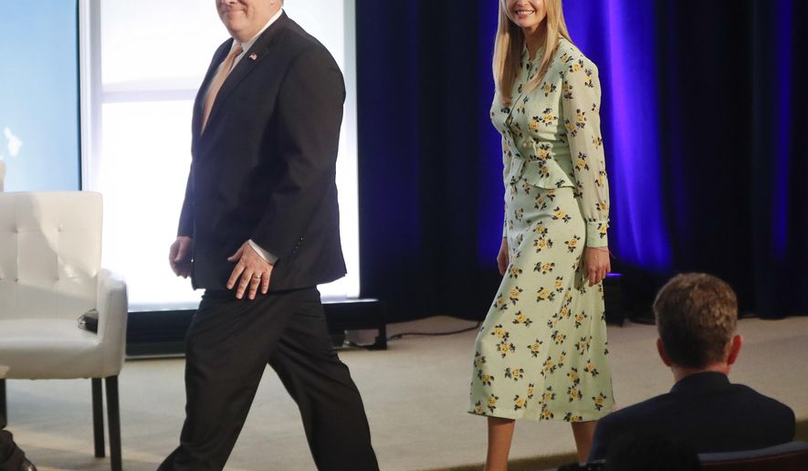 Secretary of State Mike Pompeo, left, walks in with Ivanka Trump, the daughter and assistant to President Donald Trump, during an event to announce the 2018 Trafficking in Persons Report (TIP) ceremony at the US State Department in Washington, Thursday, June 28, 2018. (AP Photo/Pablo Martinez Monsivais)