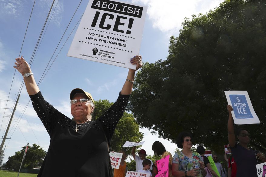 Protesters rally against the practice of separating children from their parents and families being kept at the Broward Detention Center in Pompano Beach, Fla., Thursday, June 28, 2018. Carline Jean/South Florida Sun-Sentinel via AP)