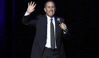 FILE - This Nov. 1, 2016, file photo, shows Jerry Seinfeld performing at Stand Up For Heroes in New York.  As “Comedians in Cars Getting Coffee” roars into its tenth season, Jerry Seinfeld realizes that with great success also comes the potential for lawsuits. He experienced it with the “Seinfeld” television series, his animated turn in “Bee Movie,” and now with his new show too.= The lawsuit comes from Christian Charles, who claims he developed the concept, and is therefore the owner of the project. Charles directed the series’ first episode. (Photo by Greg Allen/Invision/AP, File)