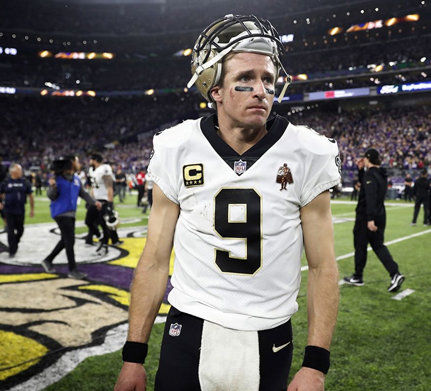 3. Drew Brees $42.9 million. New Orleans Saints quarterback Drew Brees (9) walks off the field after a 29-24 loss to the Minnesota Vikings in an NFL divisional football playoff game in Minneapolis, Sunday, Jan. 14, 2018. The Vikings defeated the Saints 29-24. (AP Photo/Jeff Roberson)