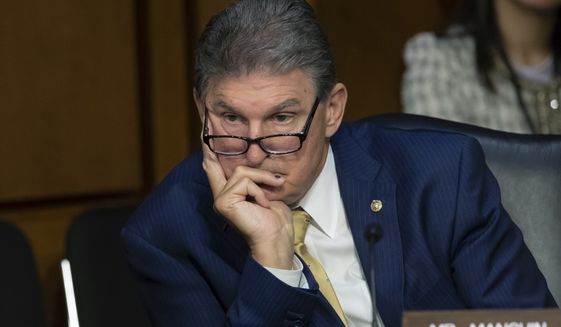 In this May 9, 2018, photo, Sen. Joe Manchin, D-W.Va., is shown during a Senate Intelligence Committee hearing on Capitol Hill in Washington. (Associated Press) **FILE**