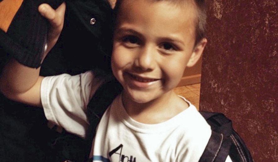 This undated photo provided by David Barron shows Anthony Avalos. Los Angeles County prosecutors have charged a mother and her boyfriend with murder and torture in the death of Avalos, the woman's 10-year-old son. Prosecutors said Friday, June 29, 2018 that Heather Maxine Barron and Kareem Ernesto Leiva are each charged with one count of murder and torture. (David Barron via AP)