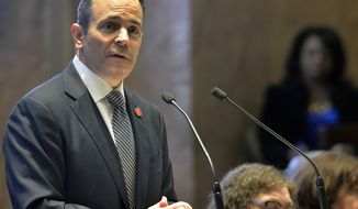 FILE - In this Tuesday, Jan. 16, 2018 file photo, Kentucky Gov. Matt Bevin speaks to a joint session of the General Assembly at the Capitol in Frankfort, Ky. A federal judge says Kentucky can&#x27;t require poor people to get a job to keep their Medicaid benefits, chastising President Donald Trump&#x27;s administration for rubber-stamping the new rules without considering how many people would lose their health coverage.  (AP Photo/Timothy D. Easley, File)