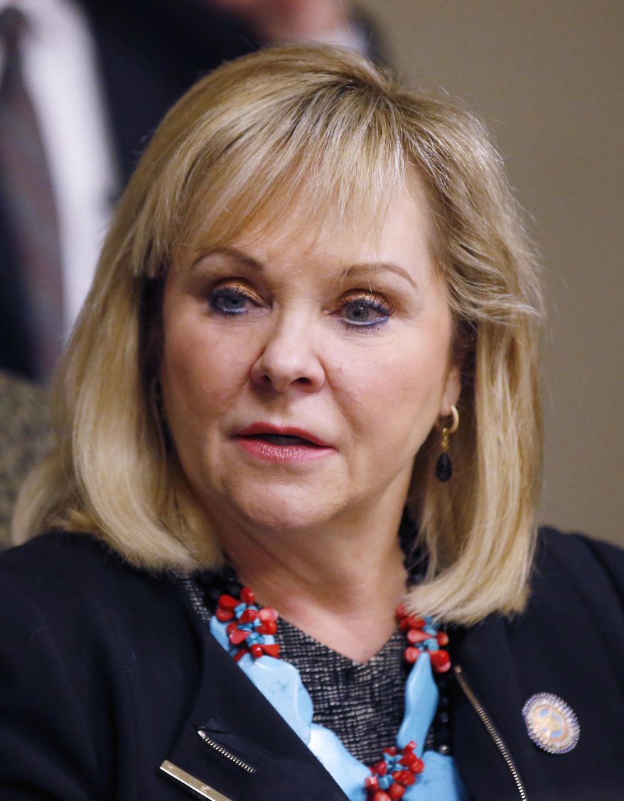 FILE - In this Tuesday, Feb. 20, 2018 file photo, Oklahoma Governor Mary Fallin speaks with the media in Oklahoma City. Fallin says she won't call the Legislature into a special session on medical marijuana, Friday, June 29, 2018. (AP Photo/Sue Ogrocki)