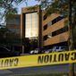 Crime scene tape surrounds a building housing The Capital Gazette newspaper&#39;s offices, Friday, June 29, 2018, in Annapolis, Md. A man armed with smoke grenades and a shotgun attacked journalists in the building Thursday, killing several people before police quickly stormed the building and arrested him, police and witnesses said. (AP Photo/Patrick Semansky) ** FILE **